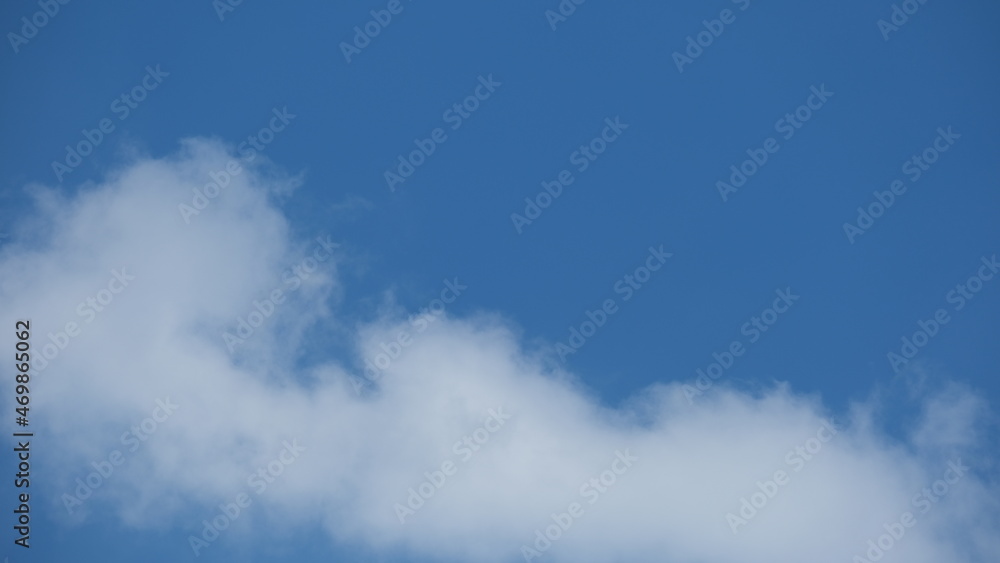 View of beautiful blue sky background with white clouds at the noon, Bangkok, Thailand. View of beautiful blue sky background with white clouds at the noon, Bangkok, Thailand.