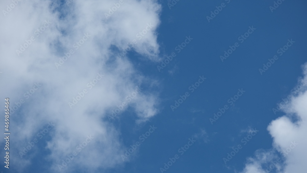 View of beautiful blue sky background with white clouds at the noon, Bangkok, Thailand. View of beautiful blue sky background with white clouds at the noon, Bangkok, Thailand.