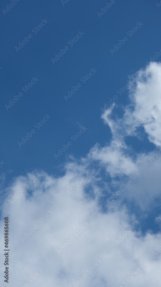 View of beautiful blue sky background with white clouds at the noon, Bangkok, Thailand. View of beautiful blue sky background with white clouds at the noon, Bangkok, Thailand.
