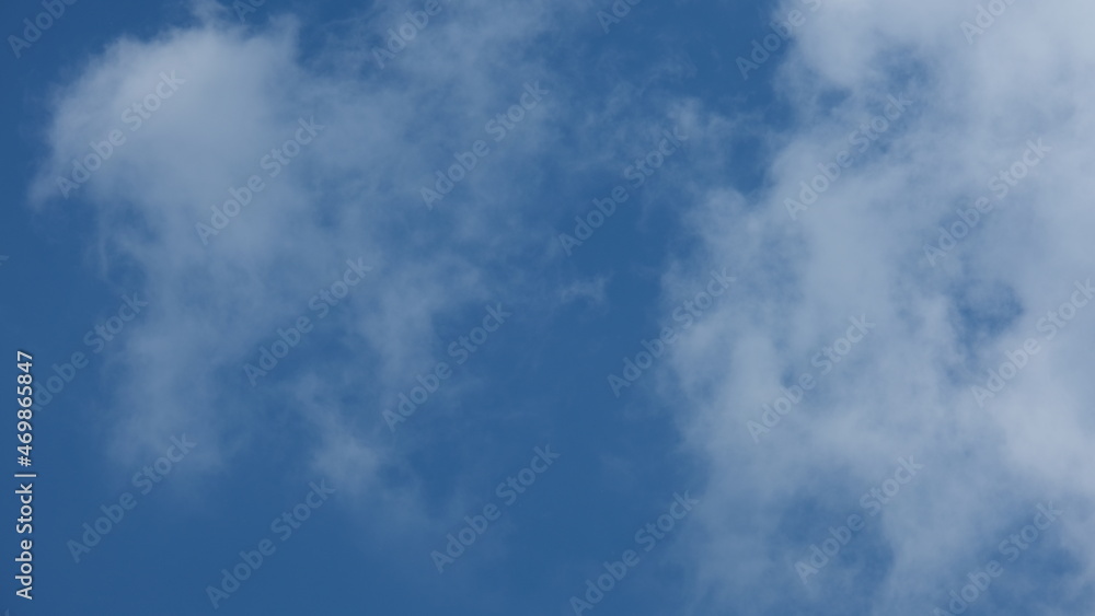 View of beautiful blue sky background with white clouds at the noon, Bangkok, Thailand. View of beautiful blue sky background with white clouds at the noon, Bangkok, Thailand.