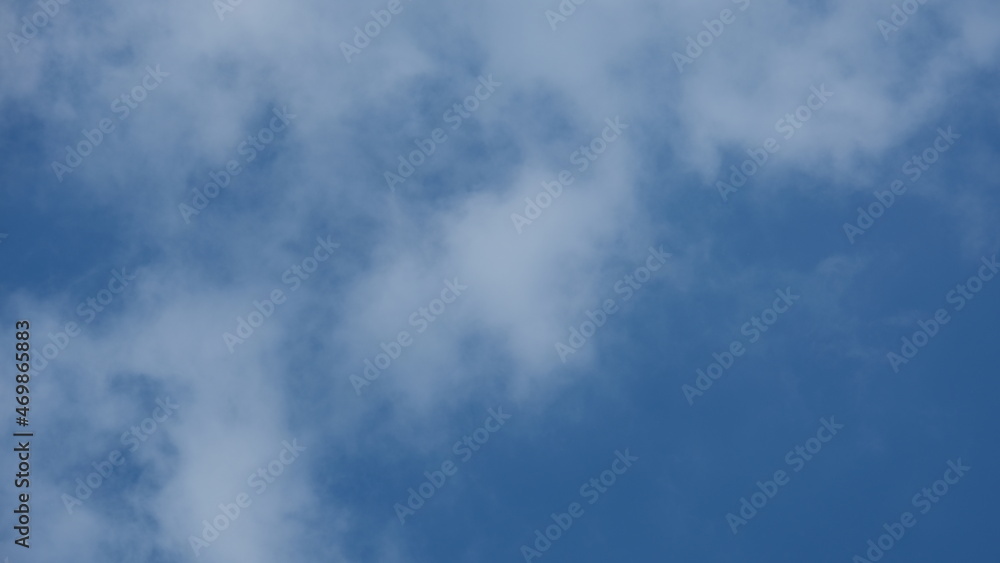 View of beautiful blue sky background with white clouds at the noon, Bangkok, Thailand. View of beautiful blue sky background with white clouds at the noon, Bangkok, Thailand.