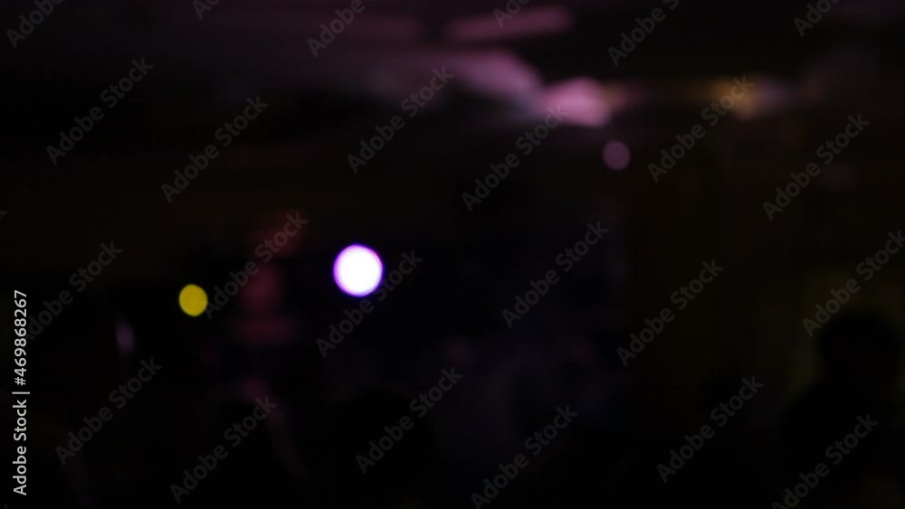 Blurred video. Young people are dancing in a nightclub. Blurred video. Young people are dancing in a nightclub.
