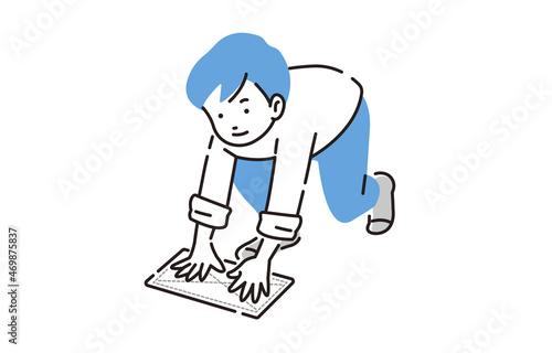 雑巾掛けをする男の子