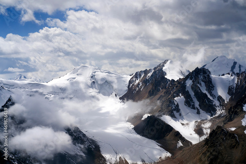 Snowy mountains and glacier, top view.