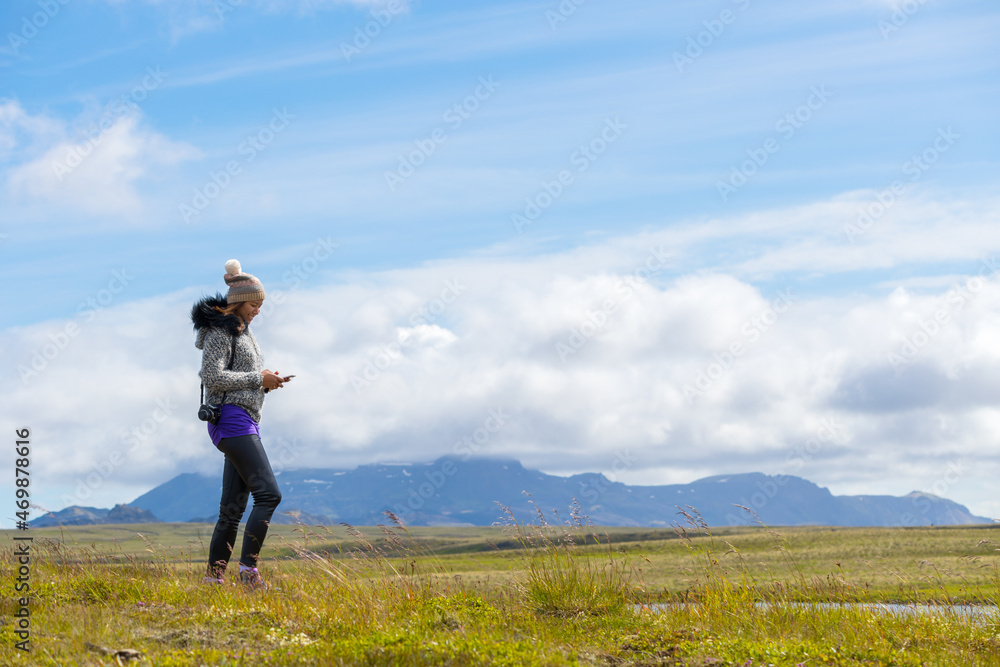 Summer time of Asian woman enjoy trip in Iceland Summer time of Asian woman enjoy trip in Iceland
