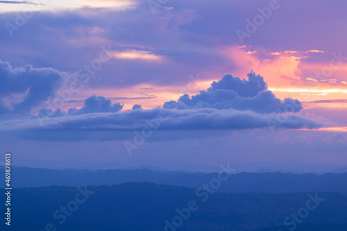 Panorama of dramatic sunset and sunrise sky over mountain