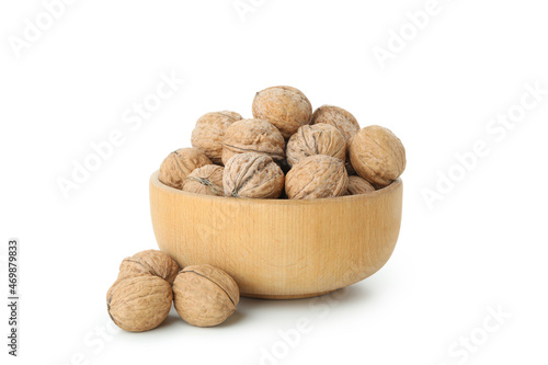 Walnuts in bowl isolated on white background