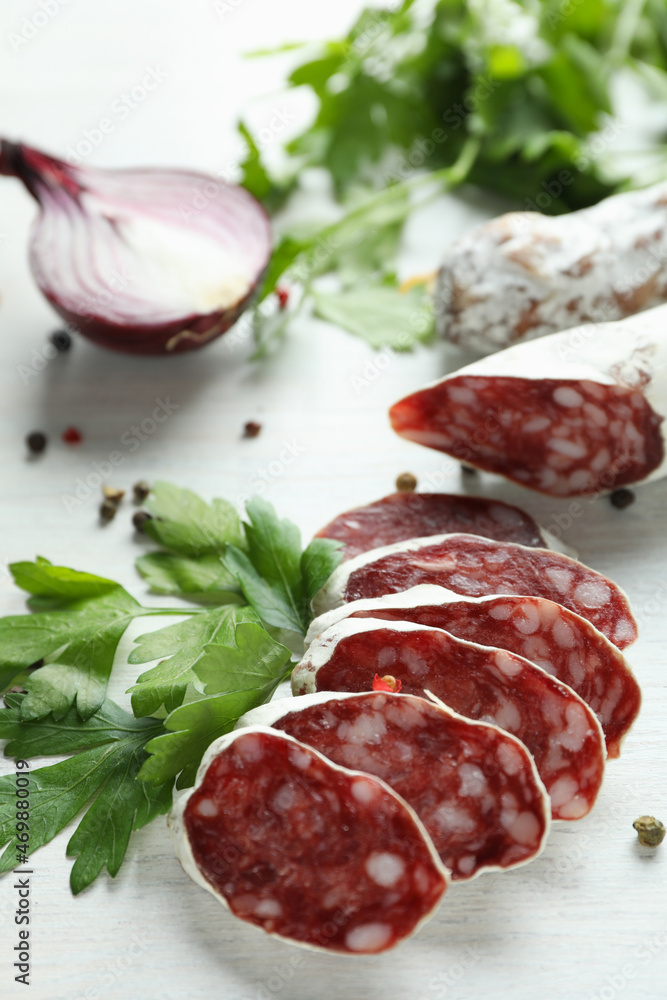 Сoncept of tasty food with salami sausage, close up Сoncept of tasty food with salami sausage, close up