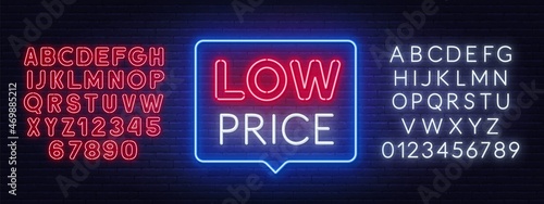 Low price neon sign in the speech bubble on brick wall background.
