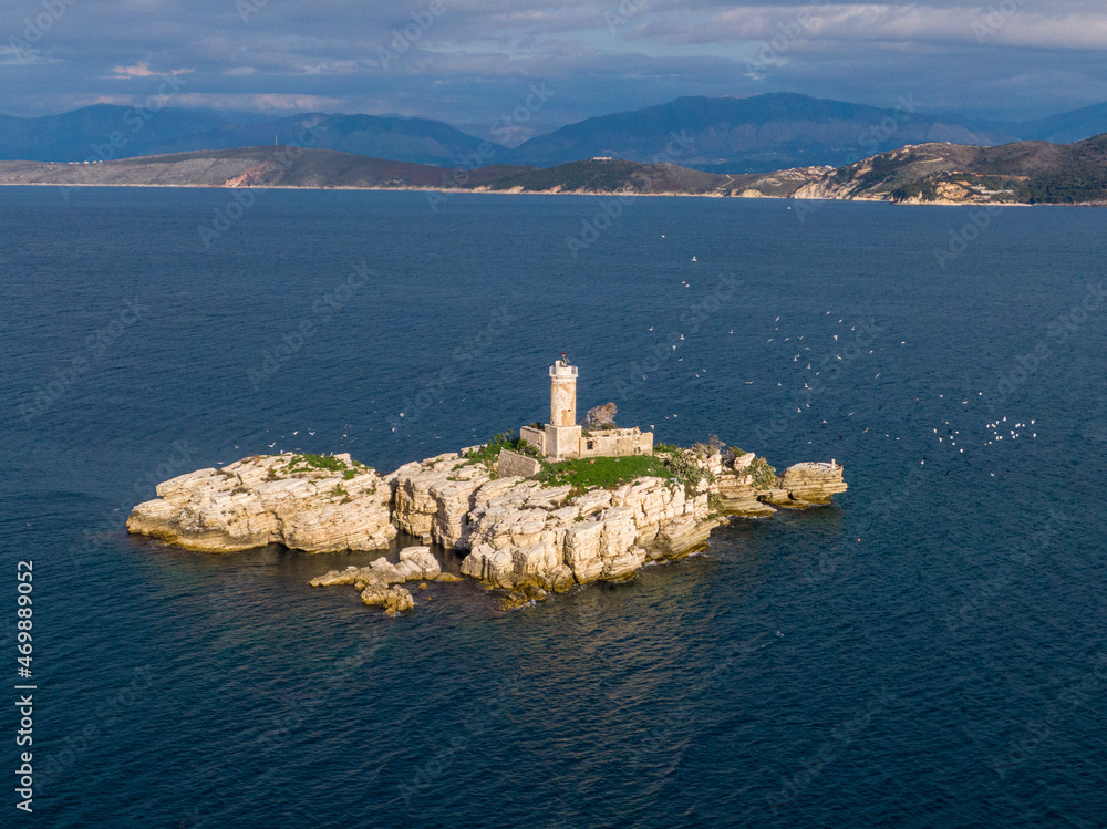  Aerial beautiful view of lighthouse with seagulls in corfu greece