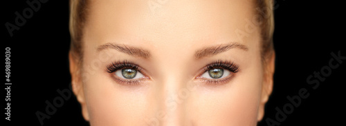 female  green eyes with makeup and long eyelashes