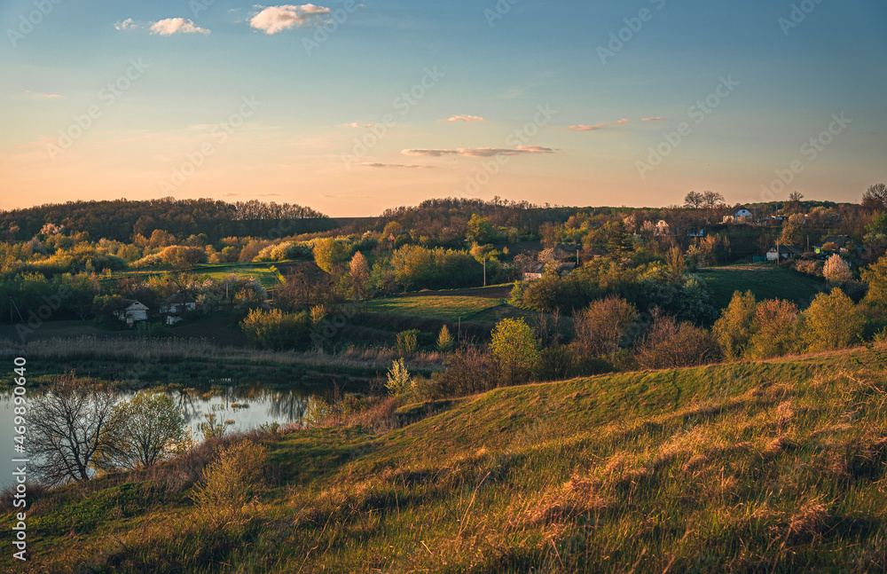 Naklejka premium Spring evening landscape