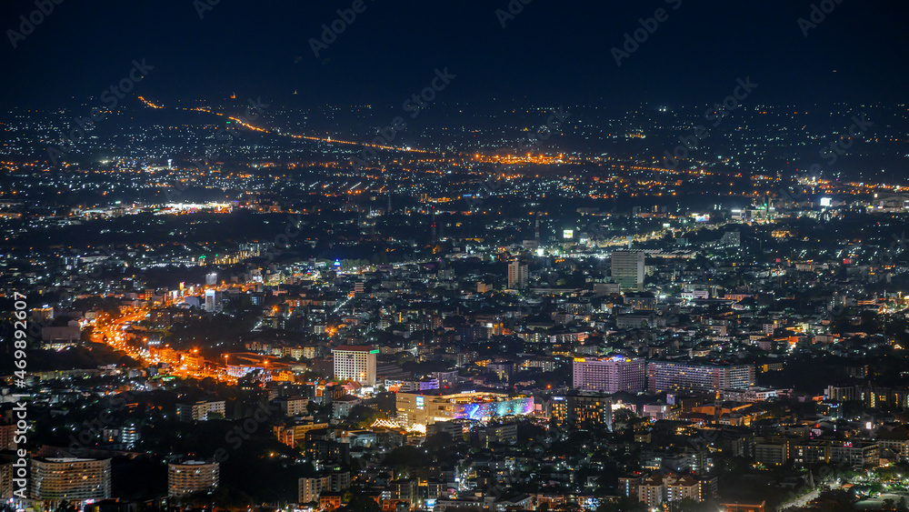 Fototapeta premium aerial view of night traffic in cityscape from the view point on top DOi SUTHEP mountains