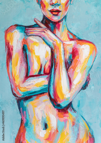 Oil portrait painting in multicolored tones. Abstract picture of a beautiful girl. Conceptual closeup of an oil painting and palette knife on canvas.