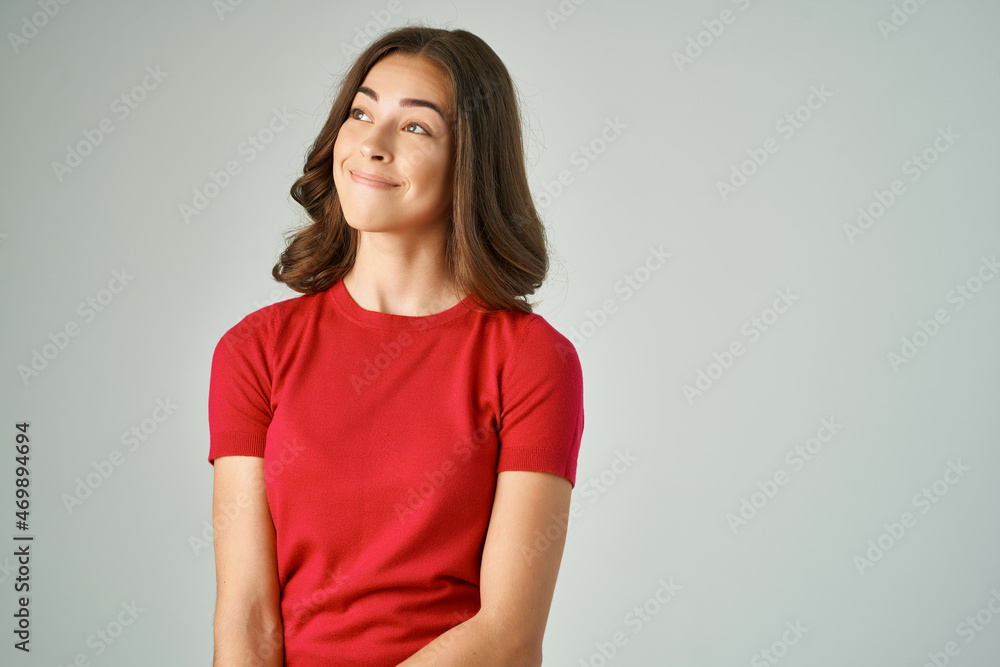 Obraz premium pretty woman holding on to hair cosmetics isolated background