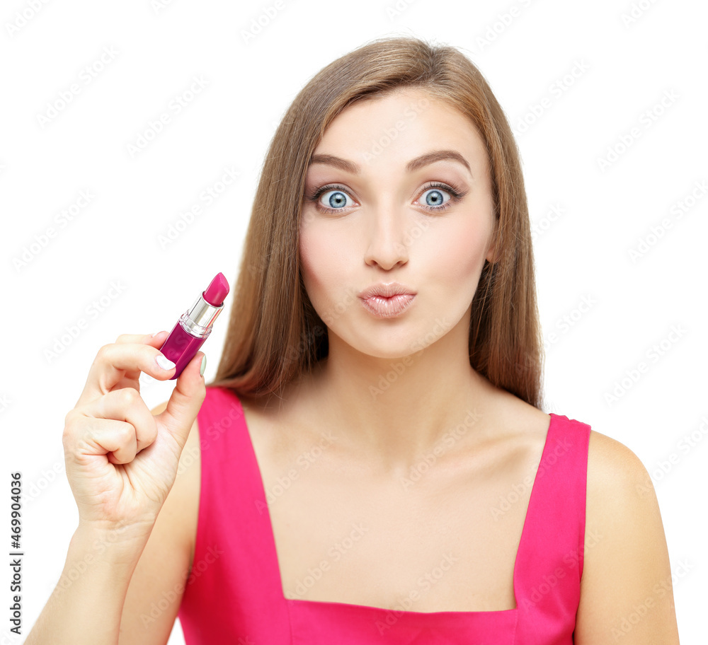 Beauty portrait of a young gir  holding pink lipstick.Pink  lipstick heart