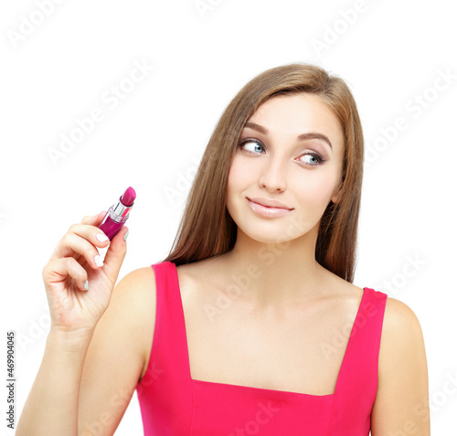 Beauty portrait of a young gir holding pink lipstick.Pink lipstick heart