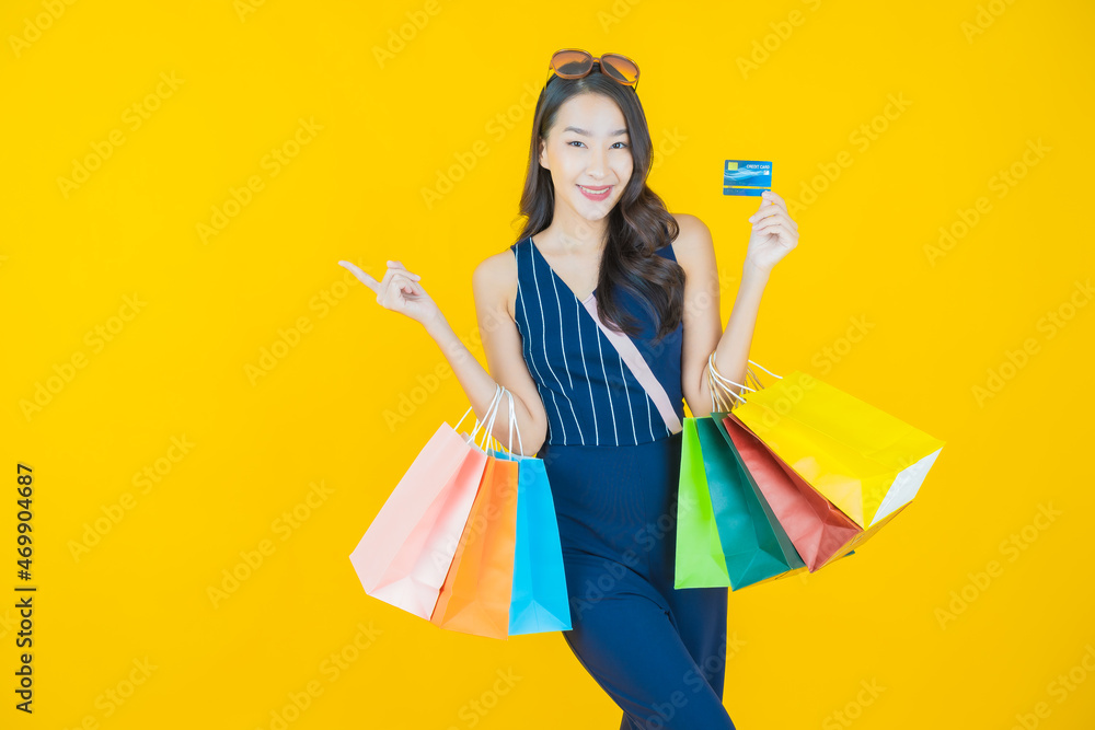 Portrait beautiful young asian woman smile with shopping bag Portrait beautiful young asian woman smile with shopping bag