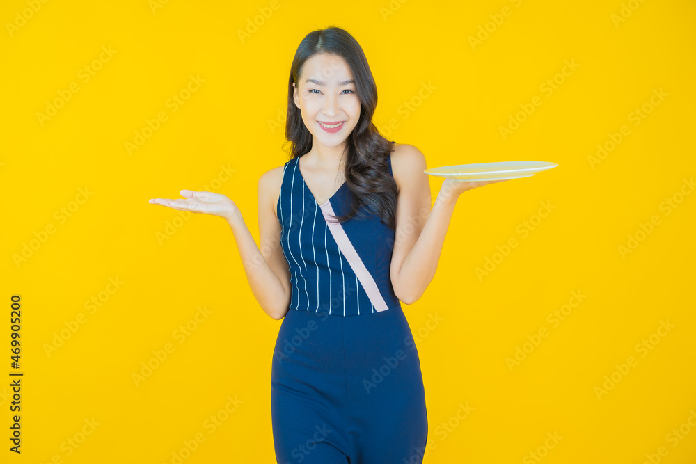 Portrait beautiful young asian woman smile with empty plate dish Portrait beautiful young asian woman smile with empty plate dish