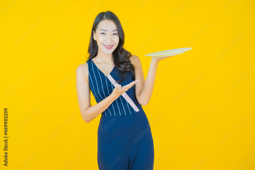 Portrait beautiful young asian woman smile with empty plate dish Portrait beautiful young asian woman smile with empty plate dish