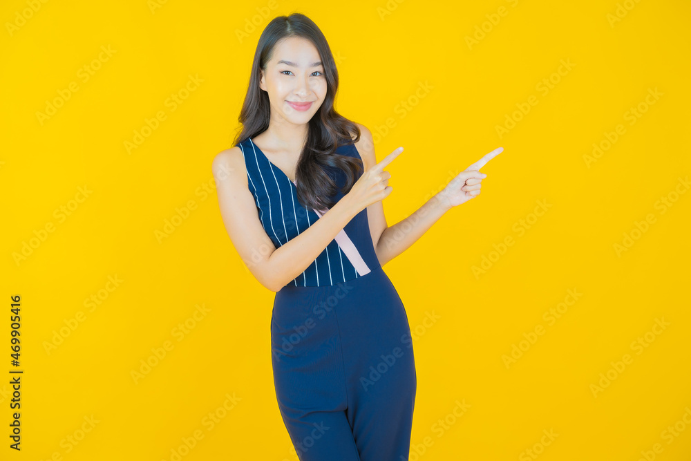 Portrait beautiful young asian woman smile with action Portrait beautiful young asian woman smile with action