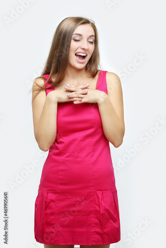 Winner.Portrait of laughing girl gesturing.