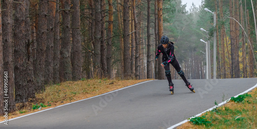 Quadro su tela Roller skating sports girl in a helmet outdoors.