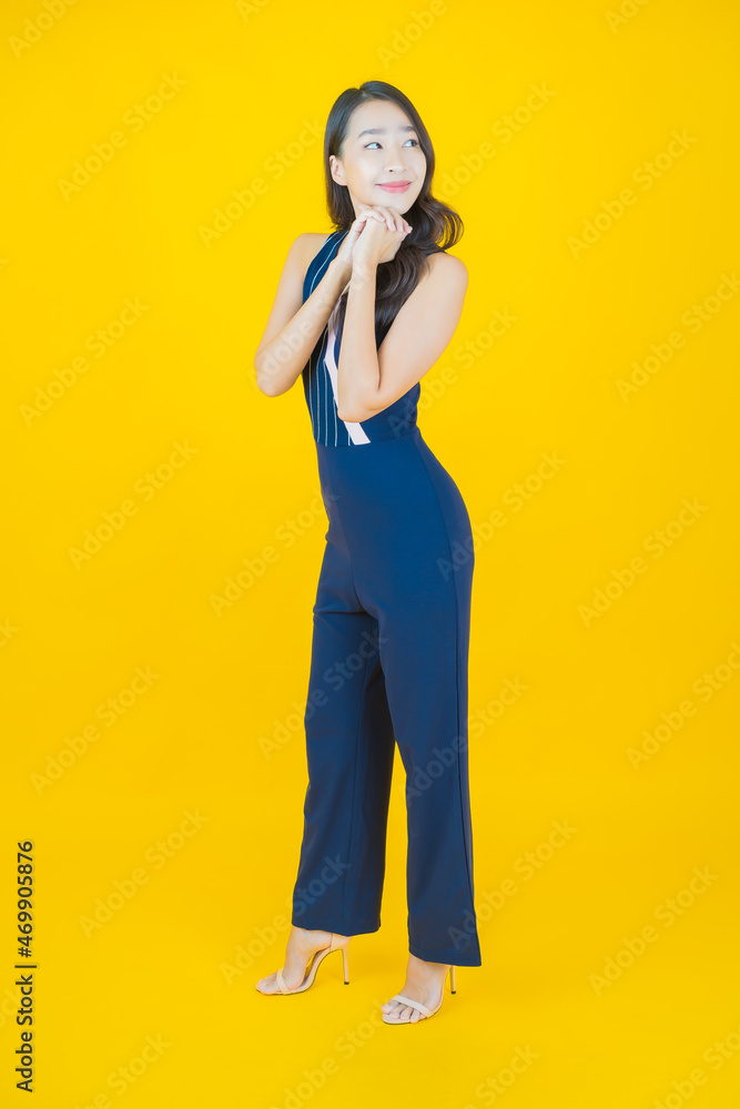 Portrait beautiful young asian woman smile with action Portrait beautiful young asian woman smile with action