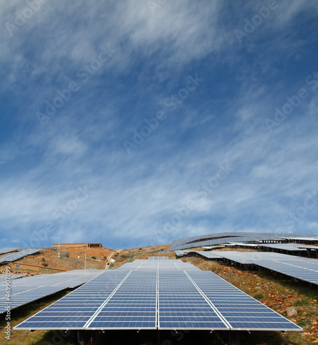 solar panels on a hill