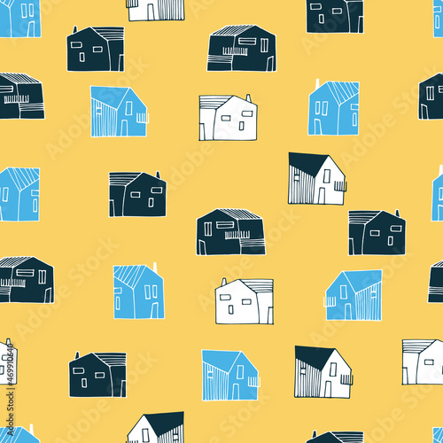 Seamless pattern with small detached, single-family houses on yellow background for surface design and other design projects