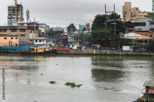 View of the San Nicolas district of Manila from Fort Santiago. In the middle of the Pasig river. Urban photo. landscape