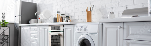 Foto modern kitchen with household devices, banner