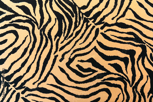 Tiger fabric texture. Symbol of 2022 Tiger