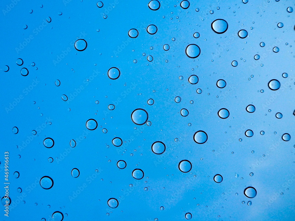 Drops of distilled water on the car's glass roof