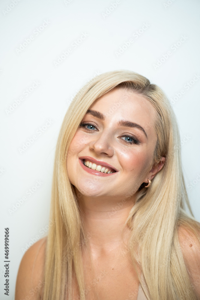 Beautiful blonde woman self make up process Beautiful blonde woman self make up process