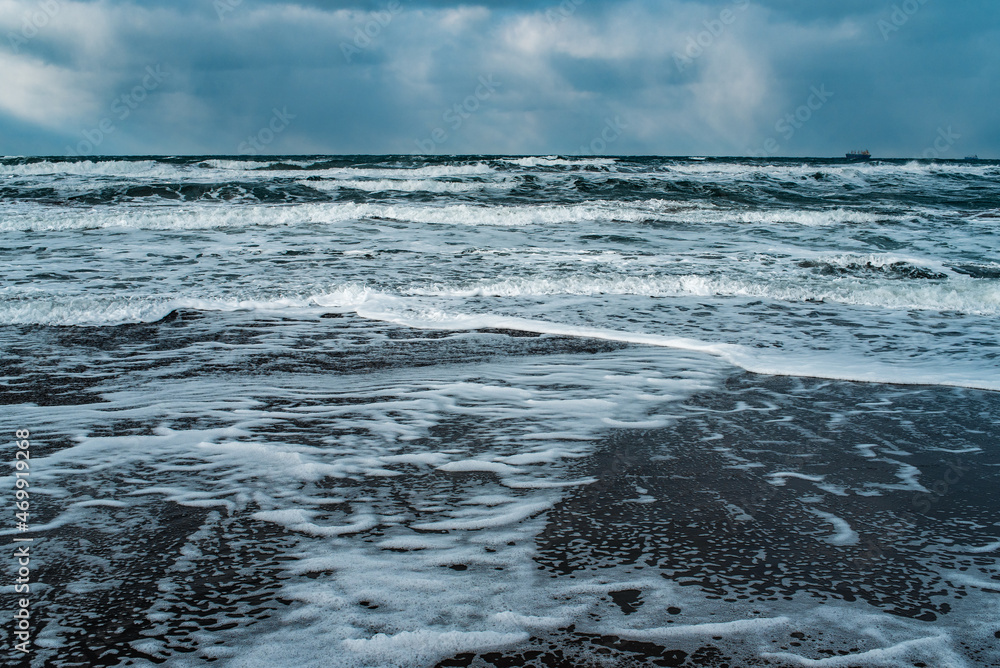 Winter landscape with frozen sea and icy beach. Storm and snow weather. Dramatic seascape. Winter landscape with frozen sea and icy beach. Storm and snow weather. Dramatic seascape.