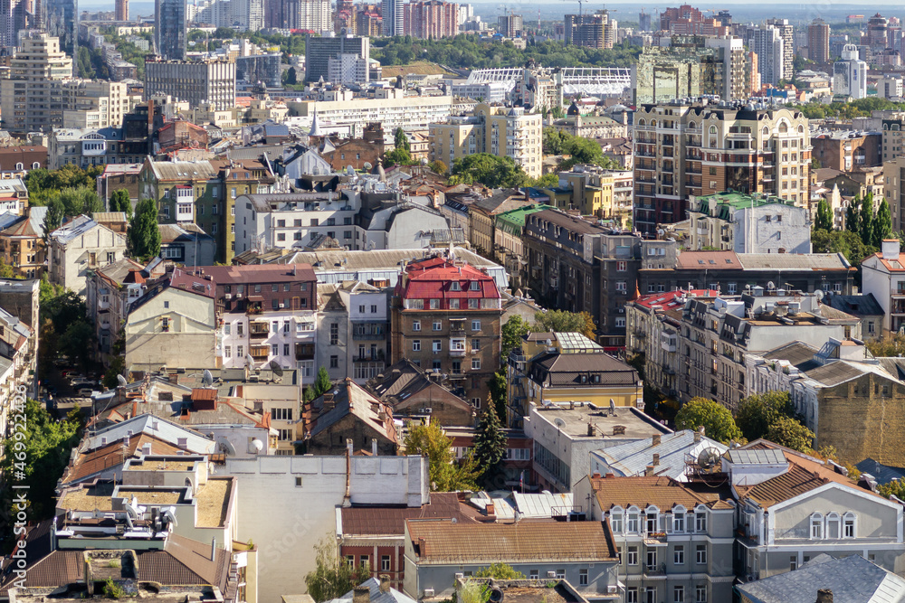 Fototapeta premium Top view of the city streets of Kiev on a summer day