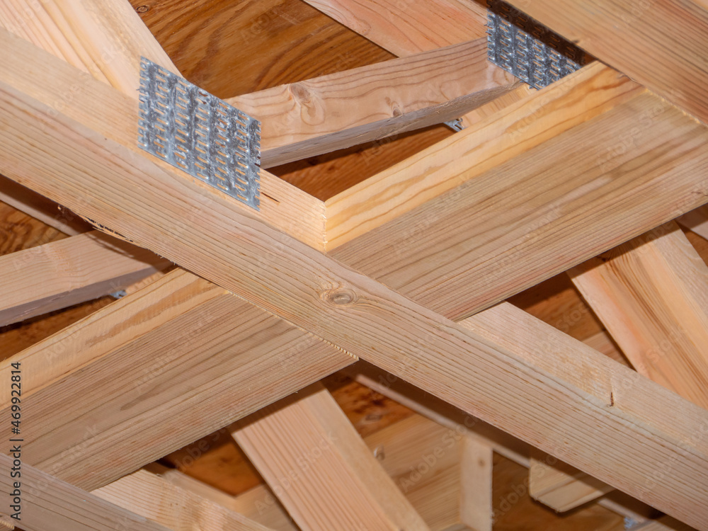 Ceiling joists of new frame house under construction. Frame house construction