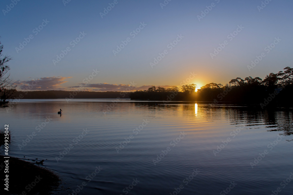 Beautiful sunset on tranquility lake river ocean sea. Water reflections stunning nature background Beautiful sunset on tranquility lake river ocean sea. Water reflections stunning nature background