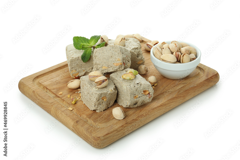 Fototapeta premium Concept of tasty food with halva isolated on white background