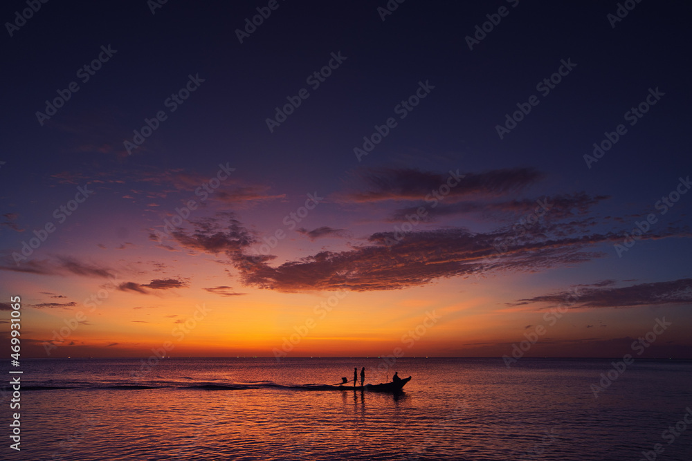 Travel by Thailand. Colorful seascape with traditional fishing boat over beautiful sunset background. Travel by Thailand. Colorful seascape with traditional fishing boat over beautiful sunset background.