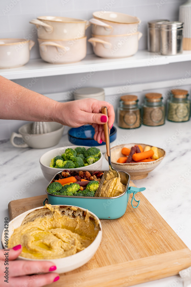 Woman meal prepping Woman meal prepping