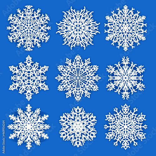 Amazing white snowflakes with shadow isolated on a solid background.
