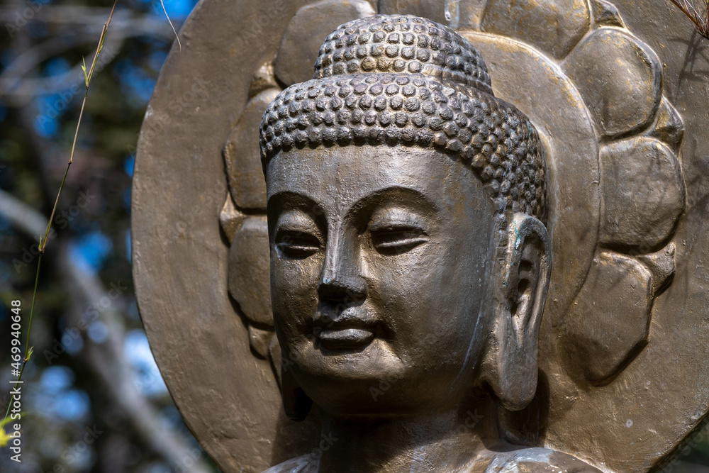 Head of Budha statue from close, outdoors