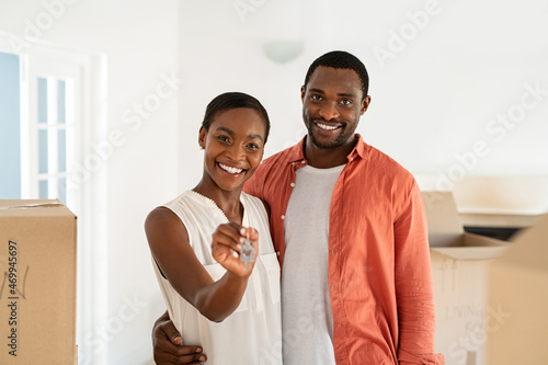 Mid adult african couple holding new house keys