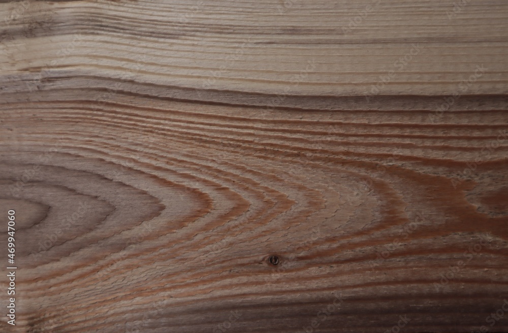 Wooden board with a beautiful natural pattern and texture, use for background.
Wooden board with a beautiful natural pattern and texture, use for background.