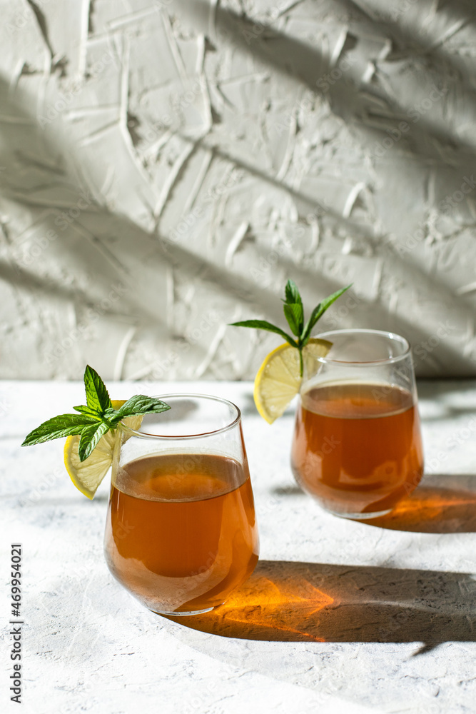 Raw fermented homemade alcoholic or non alcogolic kombucha superfood. Ice tea with healthy natural probiotic Raw fermented homemade alcoholic or non alcogolic kombucha superfood. Ice tea with healthy natural probiotic