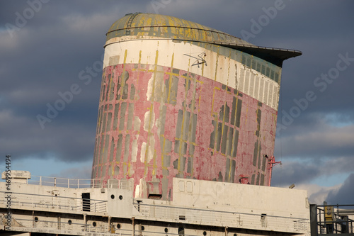 peeling paint and rust on the old and retired ocean liner which set and still holds the transatlantic crossing of the Atlantic ocean record set in 1959 shipyard awaiting restoration