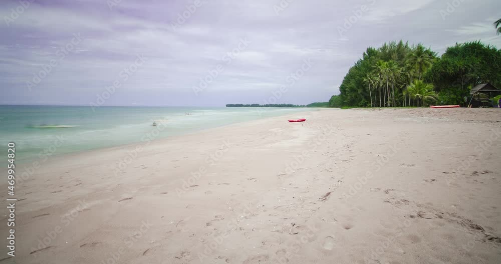 timelapse the beach with white sand and wave from peaceful sea in sunshine daytime timelapse the beach with white sand and wave from peaceful sea in sunshine daytime