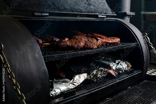 beef is smoked in an American firewood cabin photo